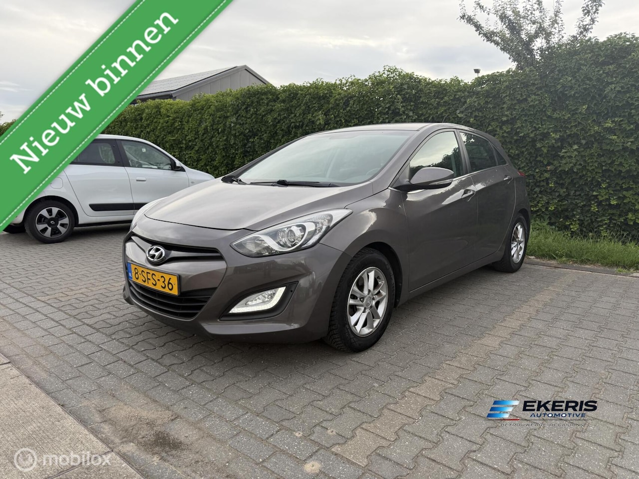 Hyundai i30 - 1.6 Automaat 2013 | Navi | Camera | Cruise | PDC - AutoWereld.nl