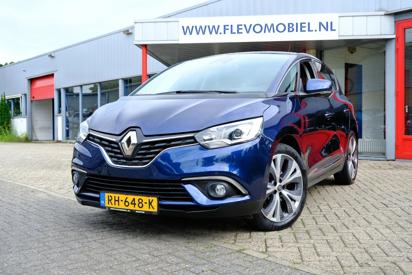 Renault Scénic - 1.2 132pk TCe Intens Navi|Half Leder|1e Eig|ParkAssist|Cam|LMV - AutoWereld.nl