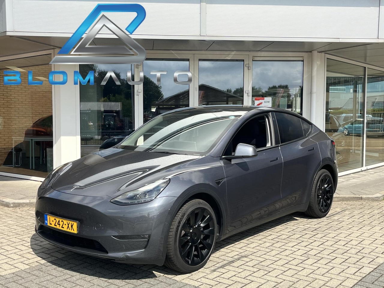 Tesla Model Y - Long Range AWD 75 kWh 352PK AUTOPILOT+20INCH - AutoWereld.nl