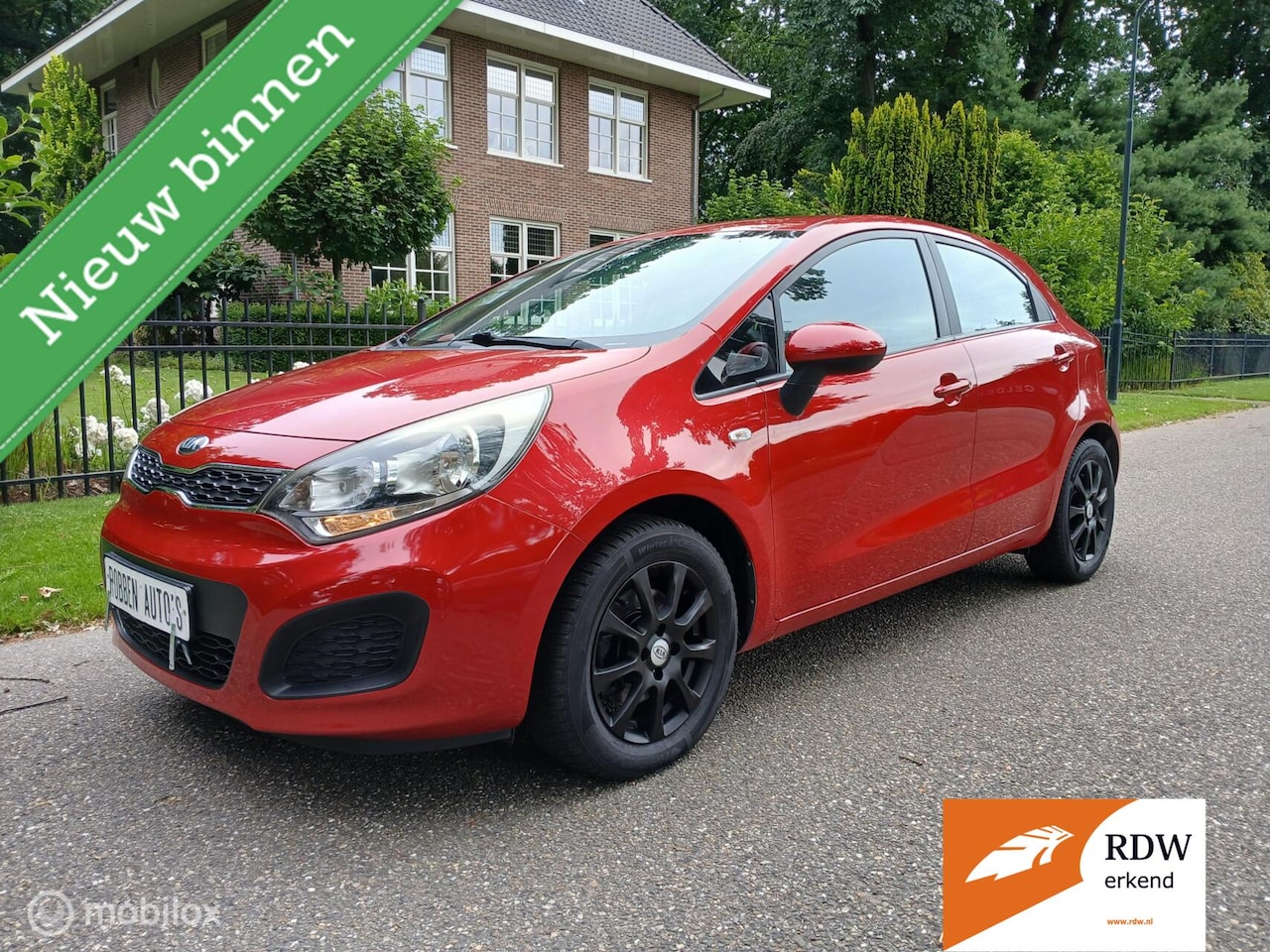 Kia Rio - red edition airco 5 deurs - AutoWereld.nl