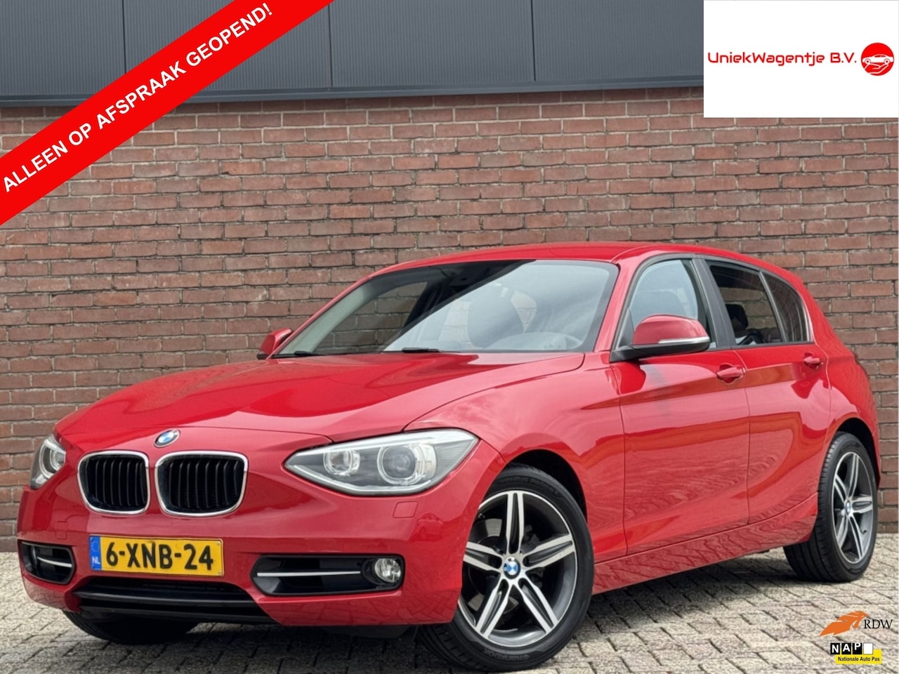 BMW 1-serie - 118I EXECUTIVE | NL-AUTO! | NAVI! | CLIMA! - AutoWereld.nl