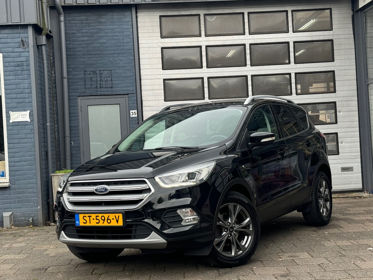 Ford Kuga - 1.5 EcoBoost Trend Ultimate | Clima | Cruise | Navi | N.A.P - AutoWereld.nl