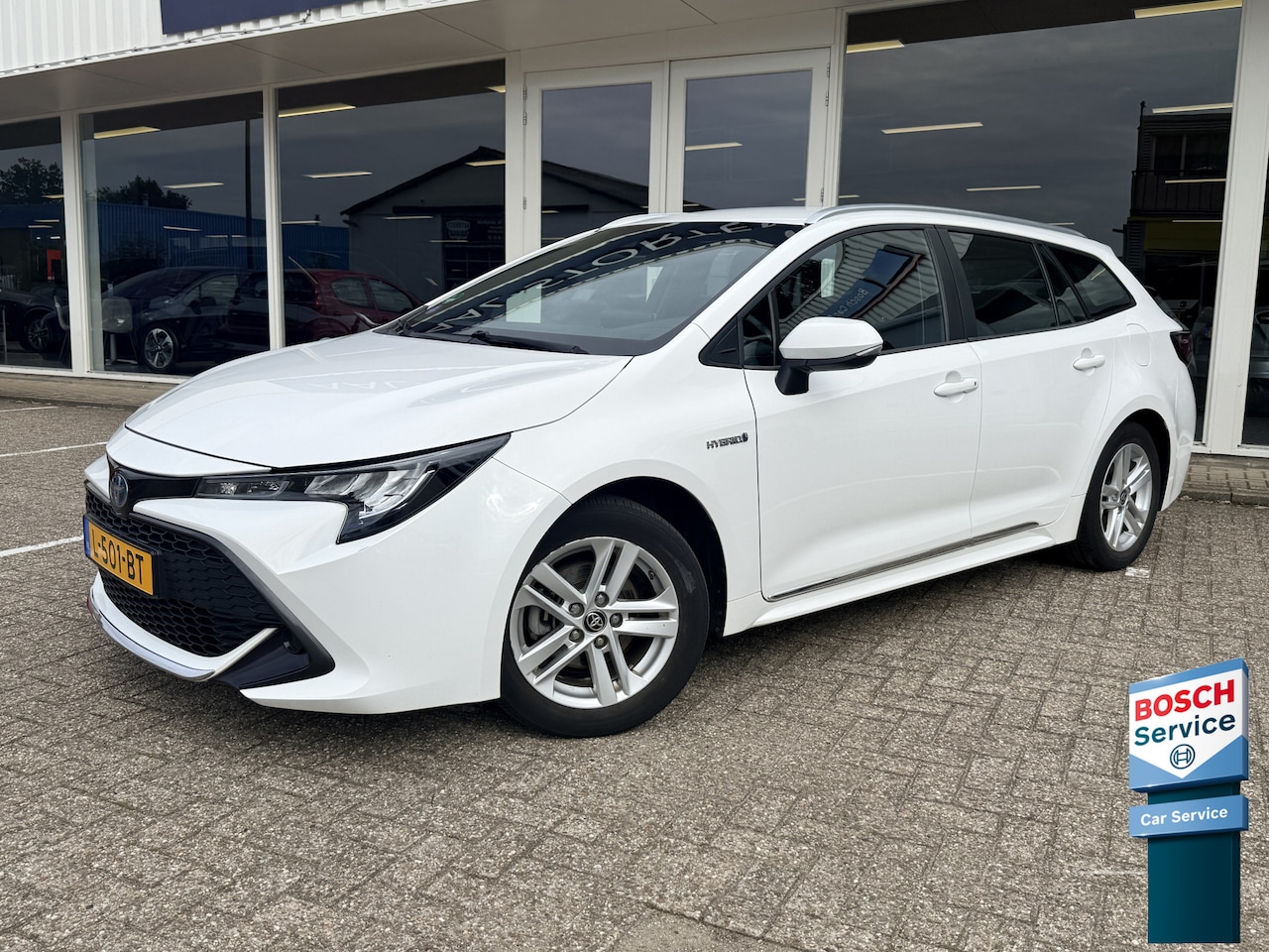 Toyota Corolla Touring Sports - 1.8 Hybrid Business | Trekhaak | LED | Adapt. Cruise | Camera | Apple/Android | Navi - AutoWereld.nl