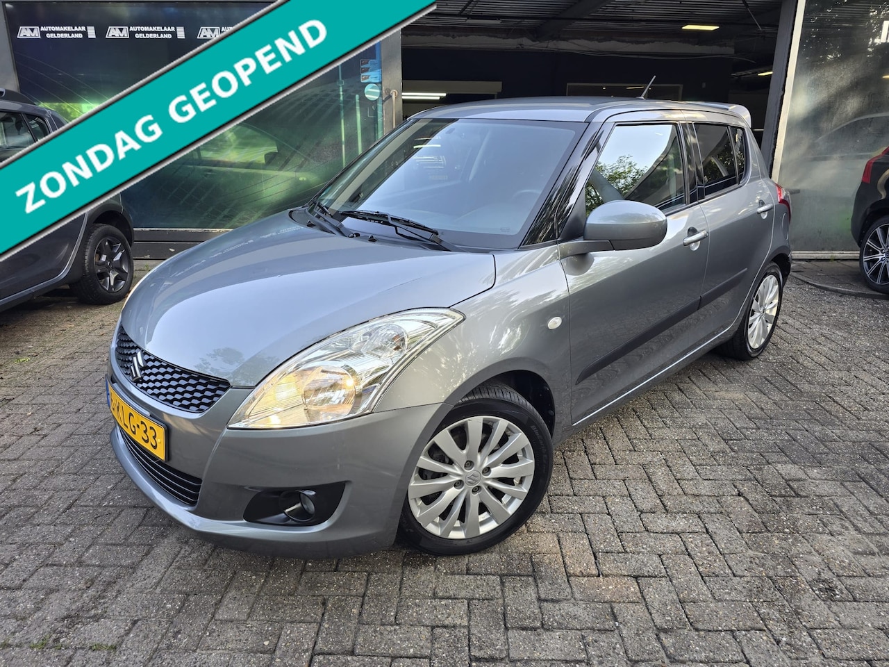 Suzuki Swift - 1.2 Exclusive EASSS| 2E EIGENAAR | 12 MND GARANTIE| NW APK| AIRCO| LMV | - AutoWereld.nl