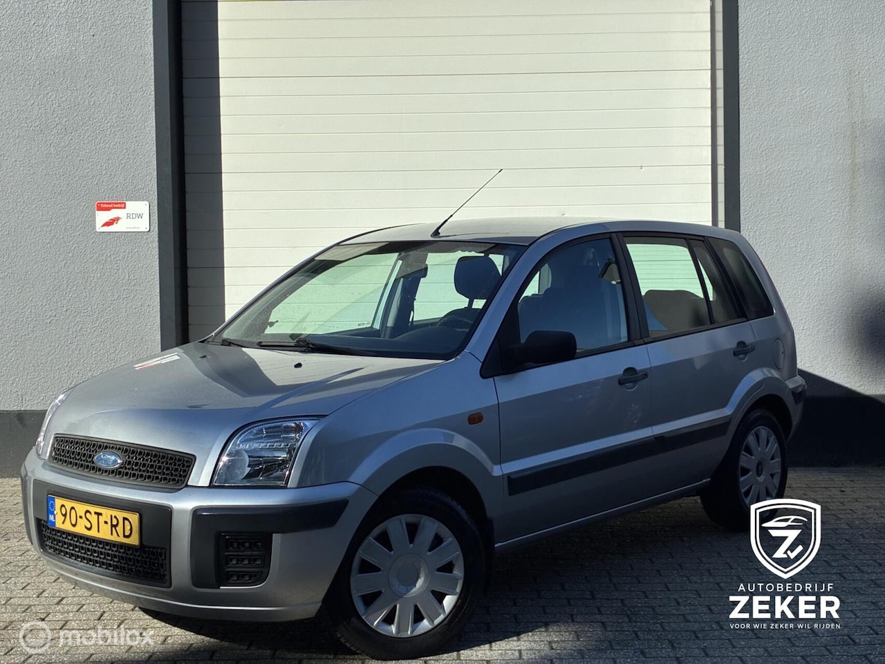 Ford Fusion - 1.4-16V Champion airco / trekhaak / nieuwe apk - AutoWereld.nl