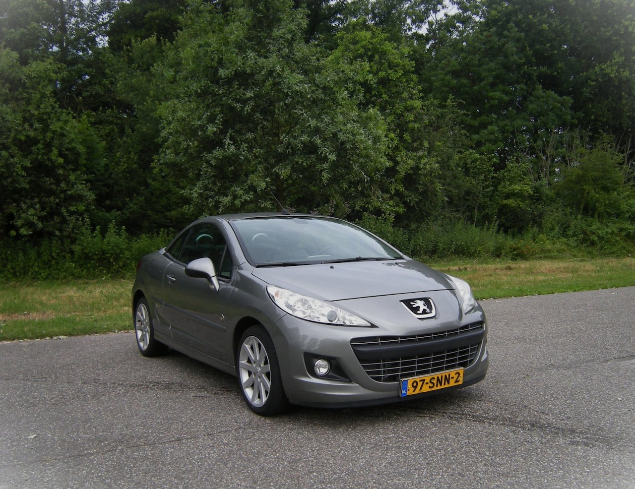 Peugeot 207 CC - 1.6 VTi Roland Garros . AUTOMAAT . Cruiscontrol . Airco . Navi . enz - AutoWereld.nl