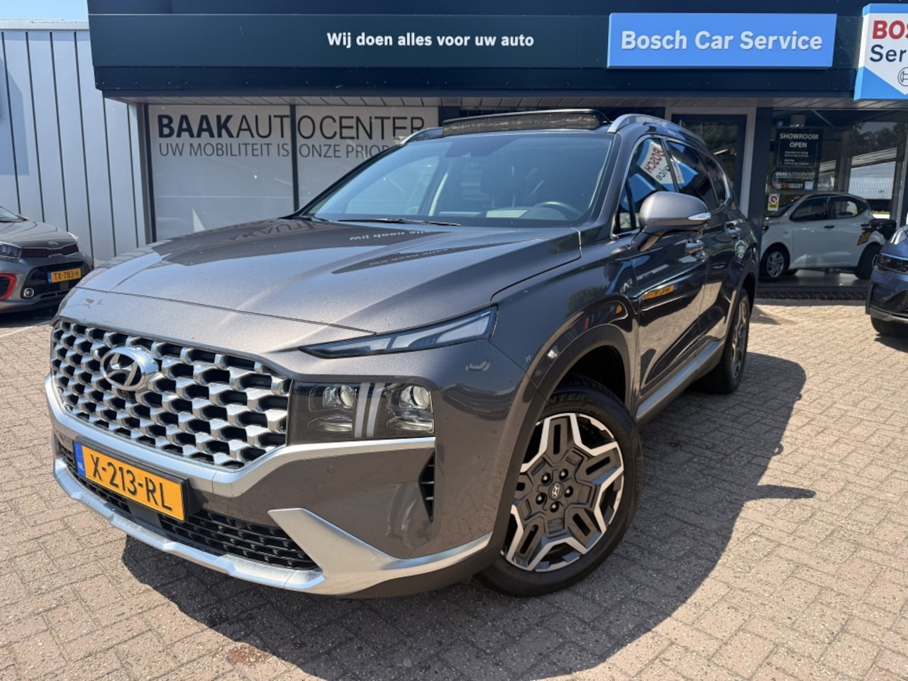 Hyundai Santa Fe - 1.6 T-GDI PHEV Premium Sky 7p. 1.6 T-GDI PHEV Premium Sky 7p | Pano | 360 | Leer - AutoWereld.nl