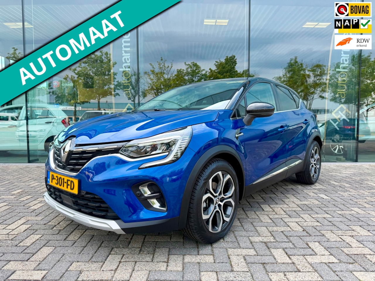 Renault Captur - 1.6 E-Tech Hybrid 145 Intens 2-tone, NAP, Camera, Navi, 18 inch - AutoWereld.nl