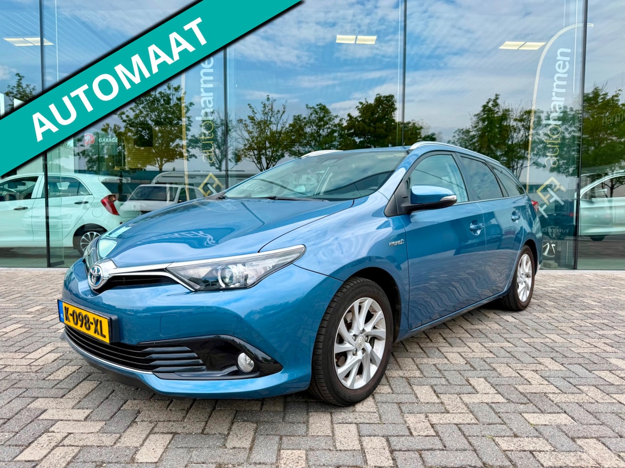 Toyota Auris Touring Sports - 1.8 Hybrid Dynamic 1.8 Hybrid Dynamic, KeyLess, Navi, Camera - AutoWereld.nl