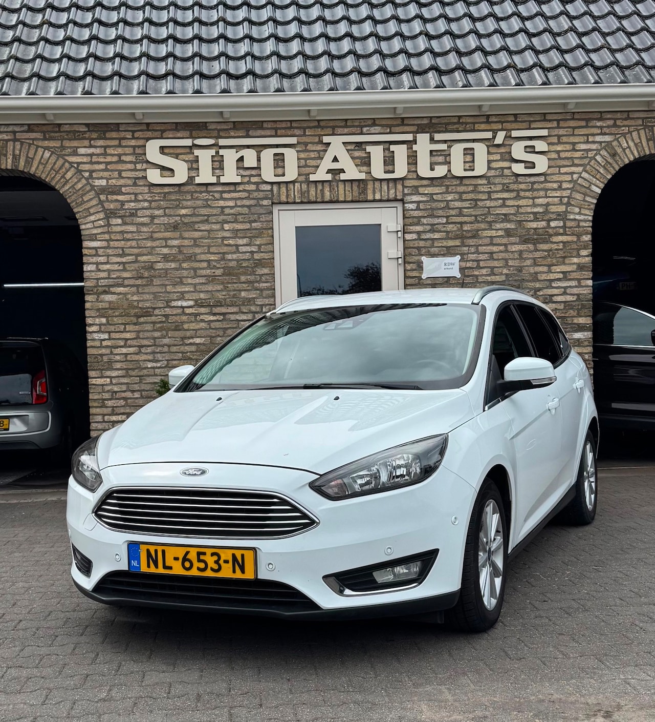 Ford Focus Wagon - 1.0 Titanium Bj 2016 Nette auto - AutoWereld.nl