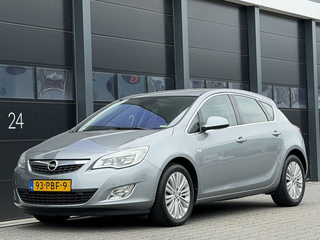 Opel Astra - 1.7 CDTi Cosmo Navi PDC - AutoWereld.nl