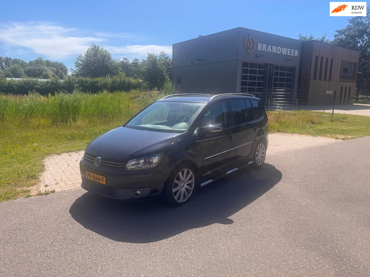 Volkswagen Touran - 1.4 TSI Highline 7p. Automaat.Clima.Navi.Camera.Pano - AutoWereld.nl