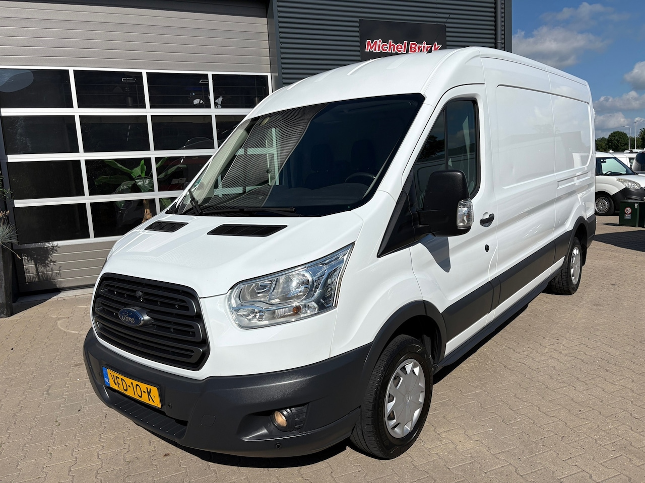 Ford Transit - 310 2.0 TDCI L2H2 Airco Emissie Euro 6 - AutoWereld.nl