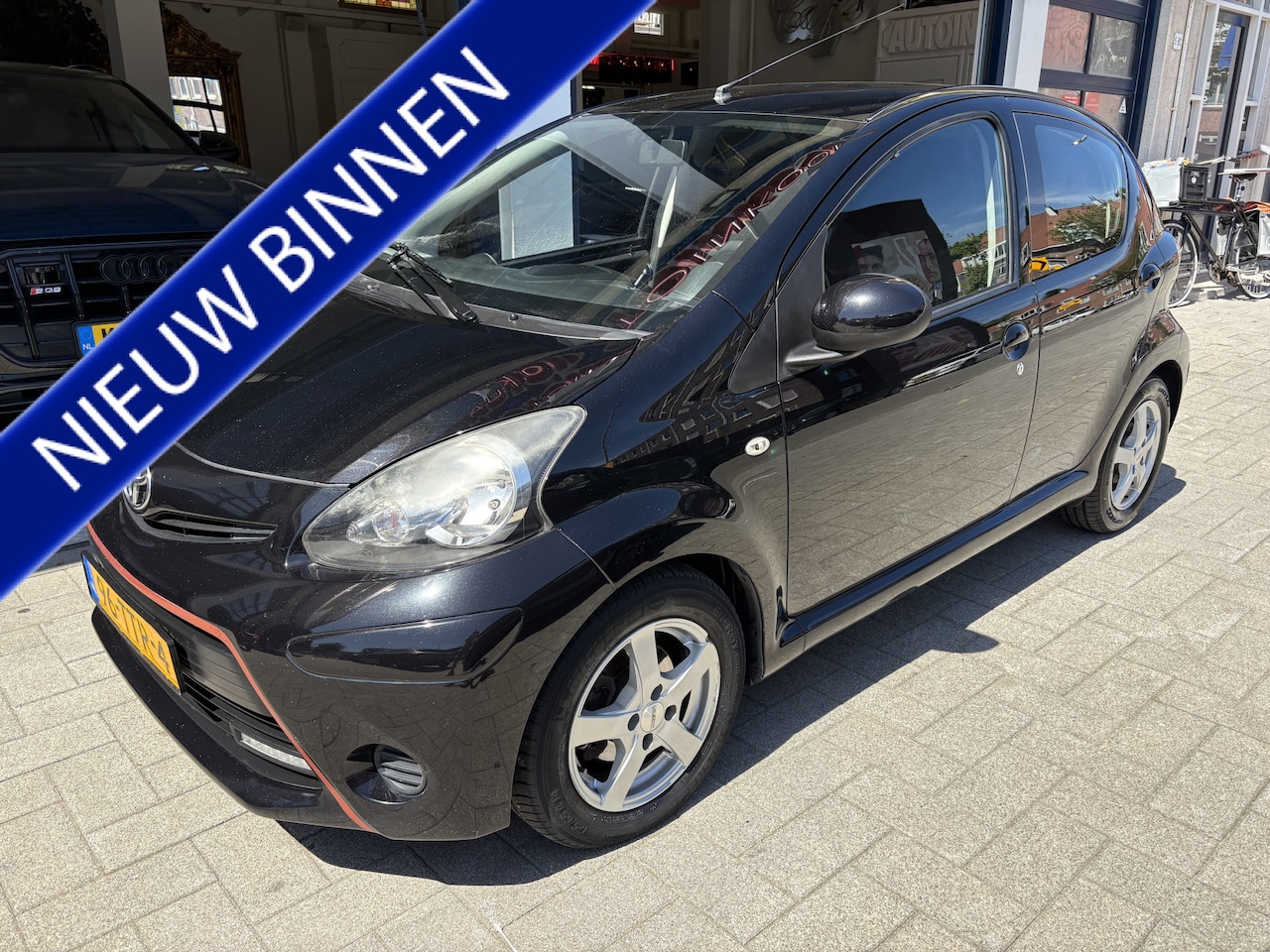 Toyota Aygo - 1.0 VVT-i Aspiration 5-DEURS/AIRCO/L.M VELGEN KACHELWEERSTAND - AutoWereld.nl