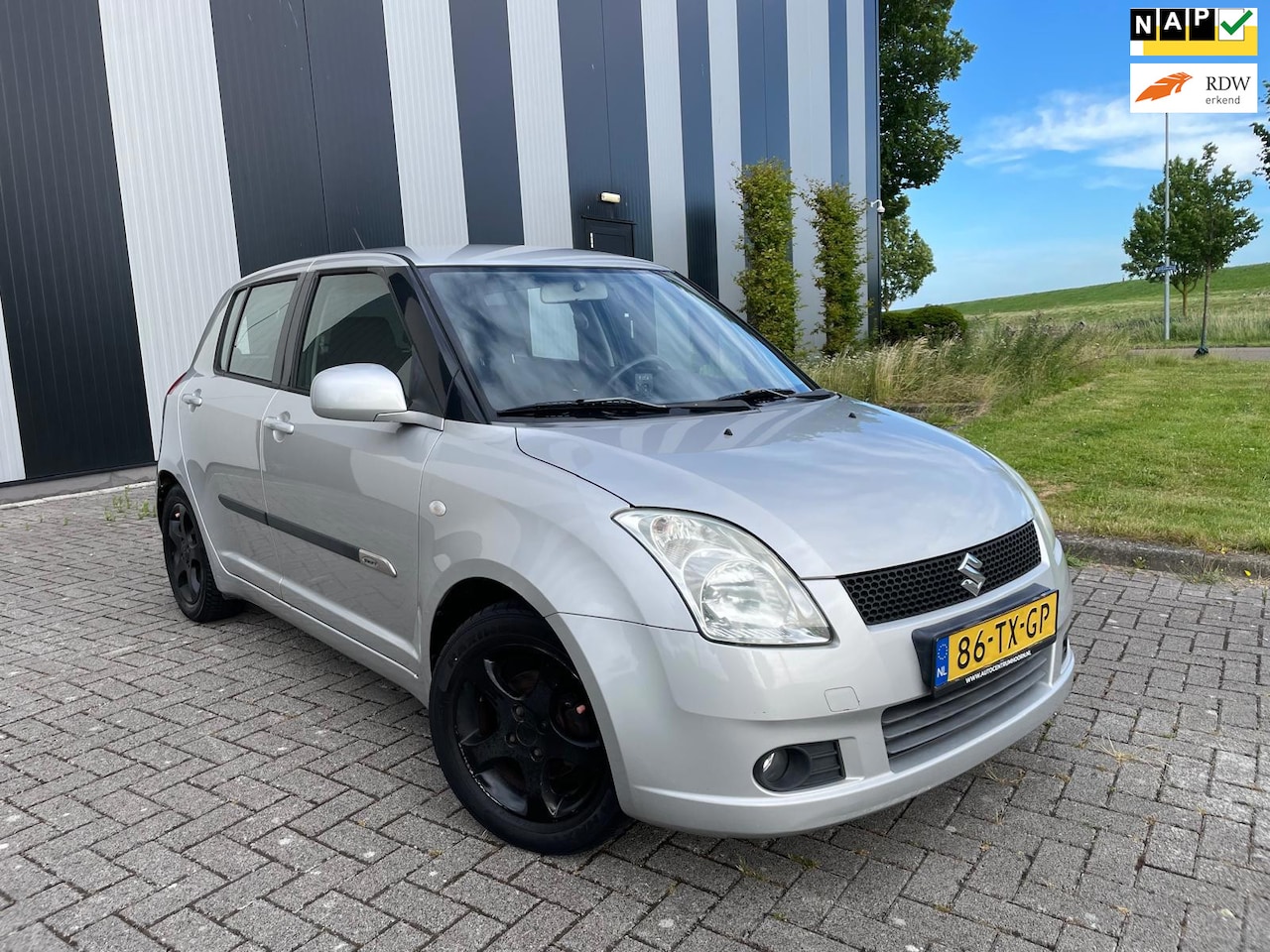 Suzuki Swift - 1.3 Shogun Nw APK-Airco-Lmv-Elekpakket - AutoWereld.nl