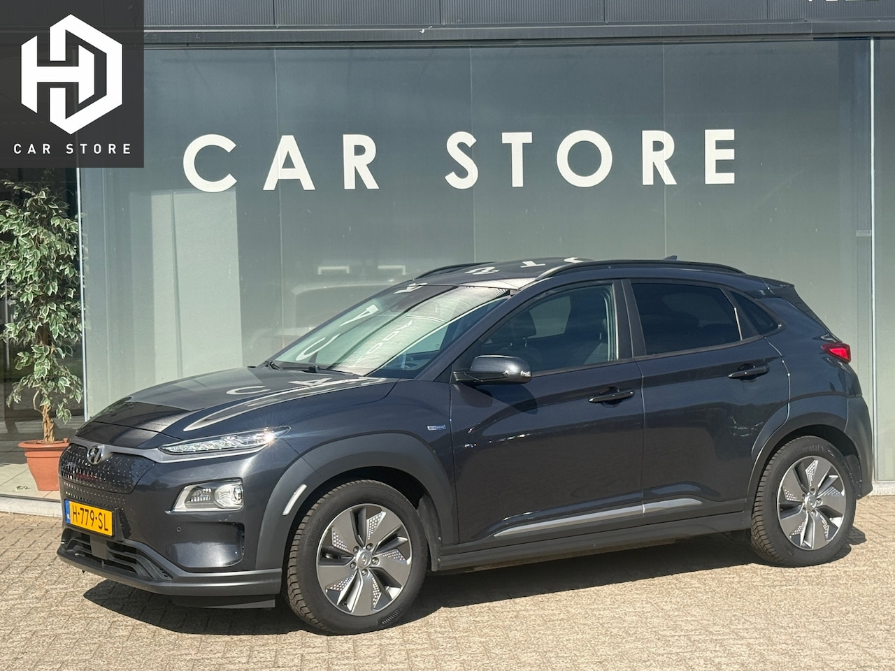 Hyundai Kona Electric - EV Premium 64 kWh 100% SOH SCHUIFDAK|TREKHAAK WARMTEPOMP - AutoWereld.nl