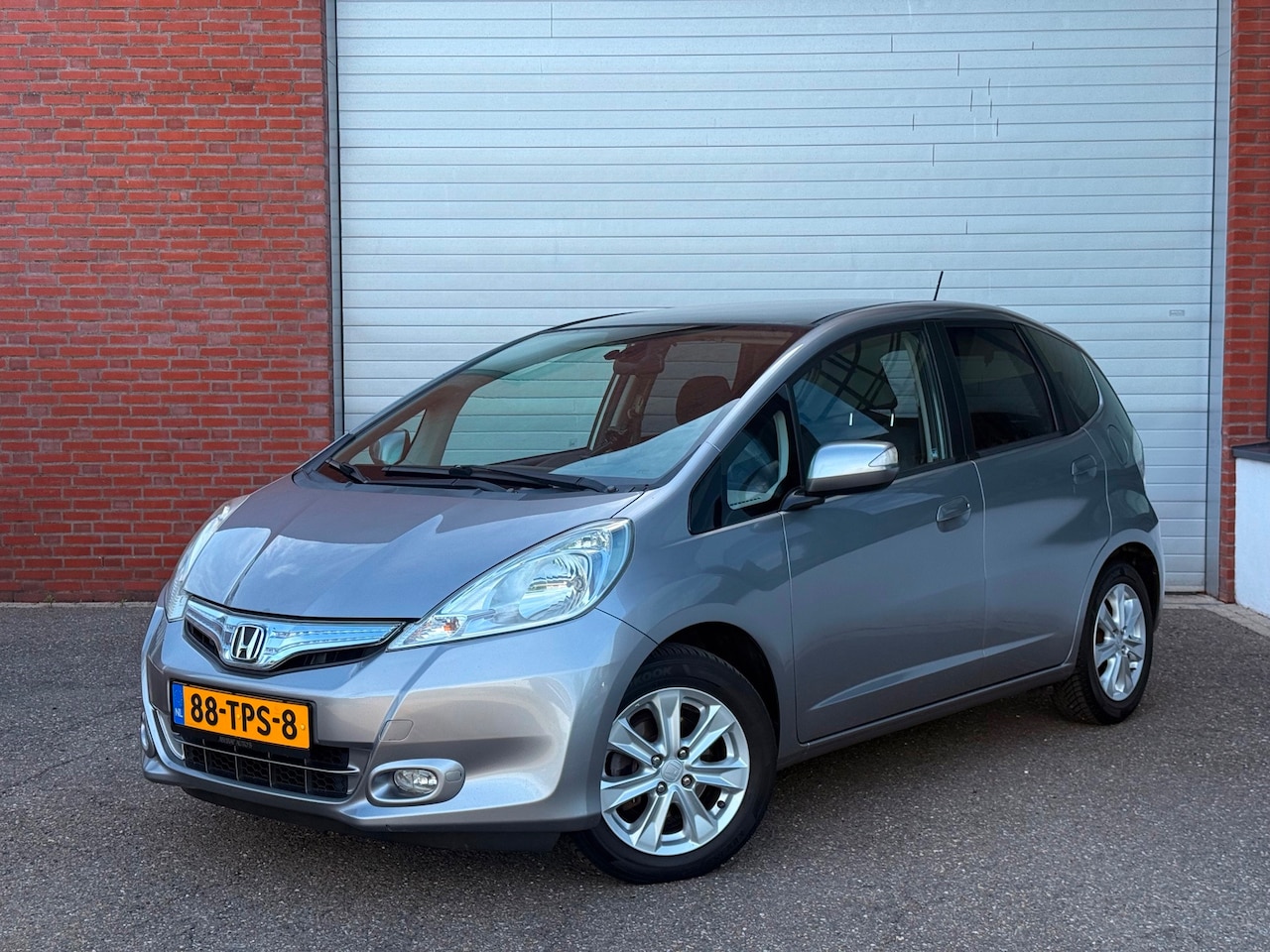 Honda Jazz - 1.4 Hybrid Elegance| AIRCO| NAP| NEW APK| PANO| NAVI - AutoWereld.nl