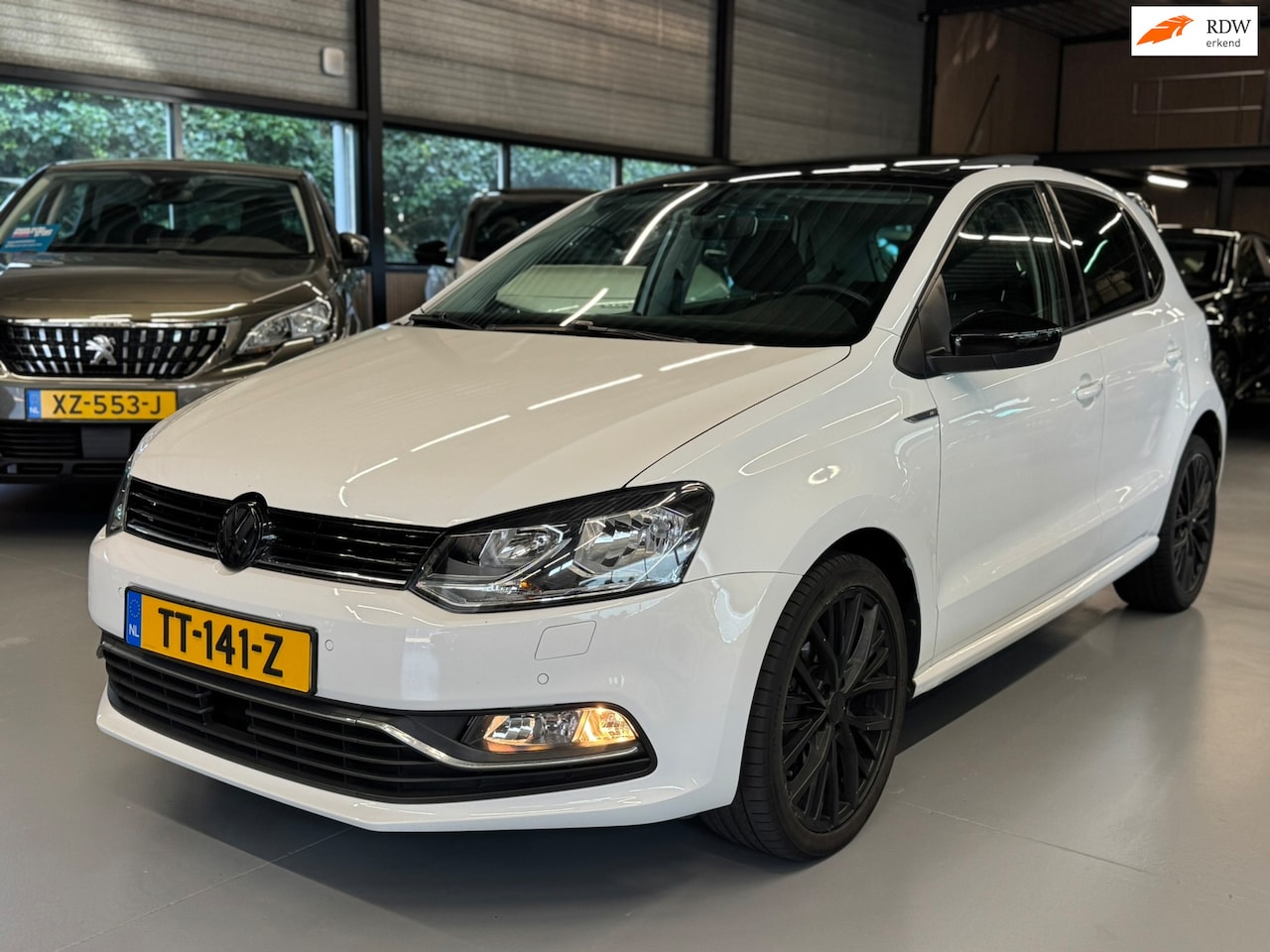Volkswagen Polo - 1.4 TDI Edition R Panorama l Clima l Navi - AutoWereld.nl