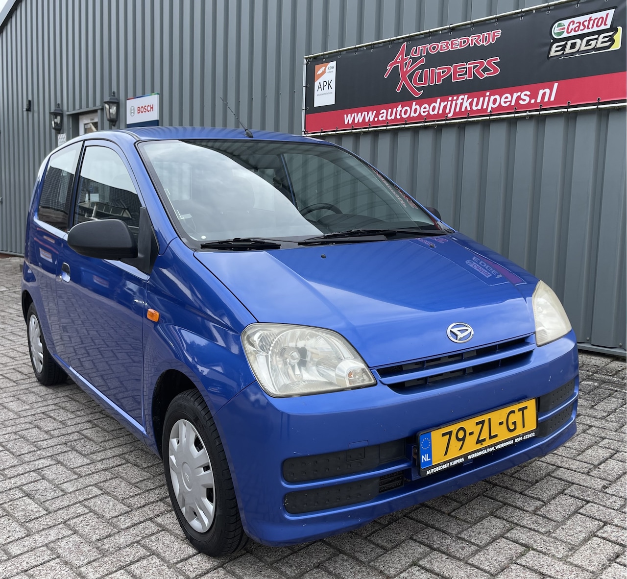 Daihatsu Cuore - 1.0-12V 100th Anniversary Stuurbekr.Audio - AutoWereld.nl
