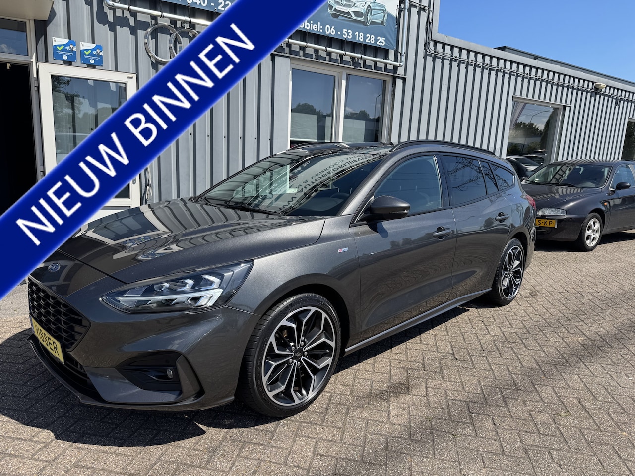 Ford Focus Wagon - 1.0 EcoBoost ST Line Business 1.0 EcoBoost ST Line Business - AutoWereld.nl