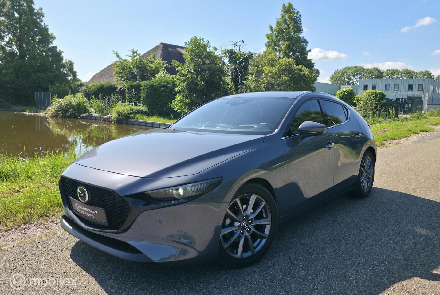 Mazda 3 - 2.0 e-SkyActiv-G M Hybrid / 360' Cam. / HUD / Navi - AutoWereld.nl