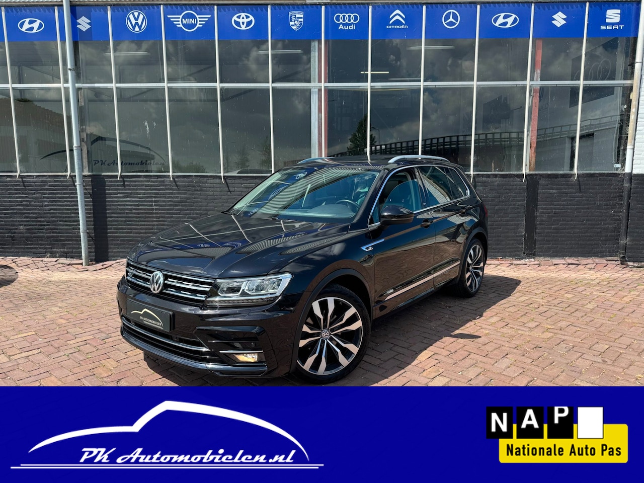 Volkswagen Tiguan - 1.4 TSI SOUND Business R-Line **PANO + TREKH + LEDER + MEMORY** - AutoWereld.nl
