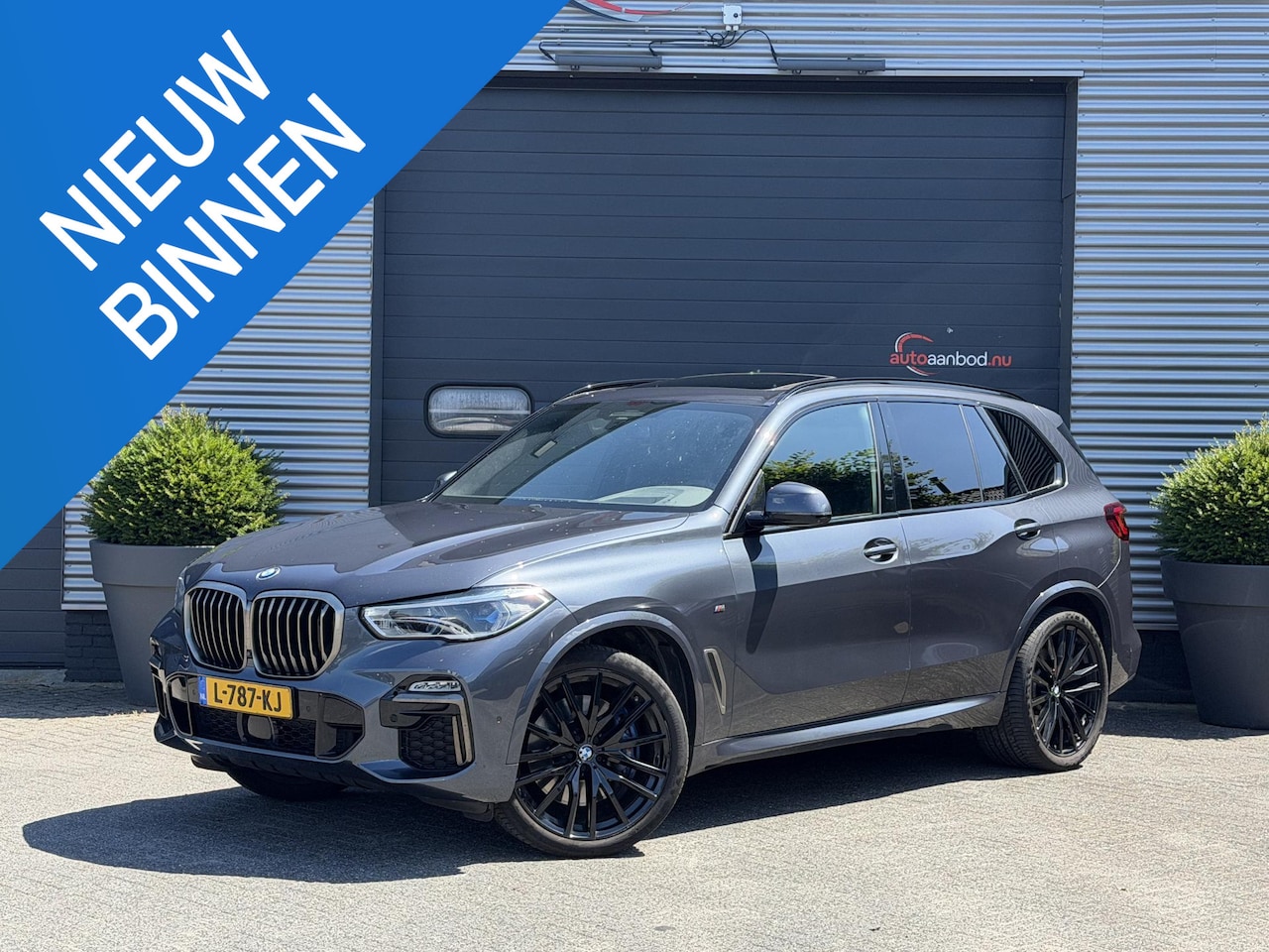 BMW X5 - M50i High Executive | M-Sport | Panoramadak | 360* Camera | Skylounge | Laser | Elektrisch - AutoWereld.nl