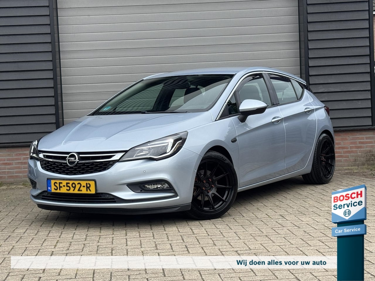 Opel Astra - 1.4 Turbo 180PK Automaat / Camera / Navi / Cruise / Lane assist / Dubbele set wielen / Ble - AutoWereld.nl