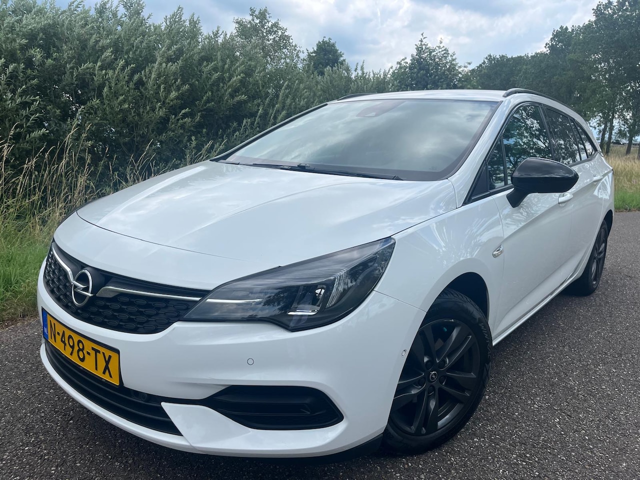 Opel Astra Sports Tourer - 1.2 Design & Tech 1.2 Design & Tech - AutoWereld.nl