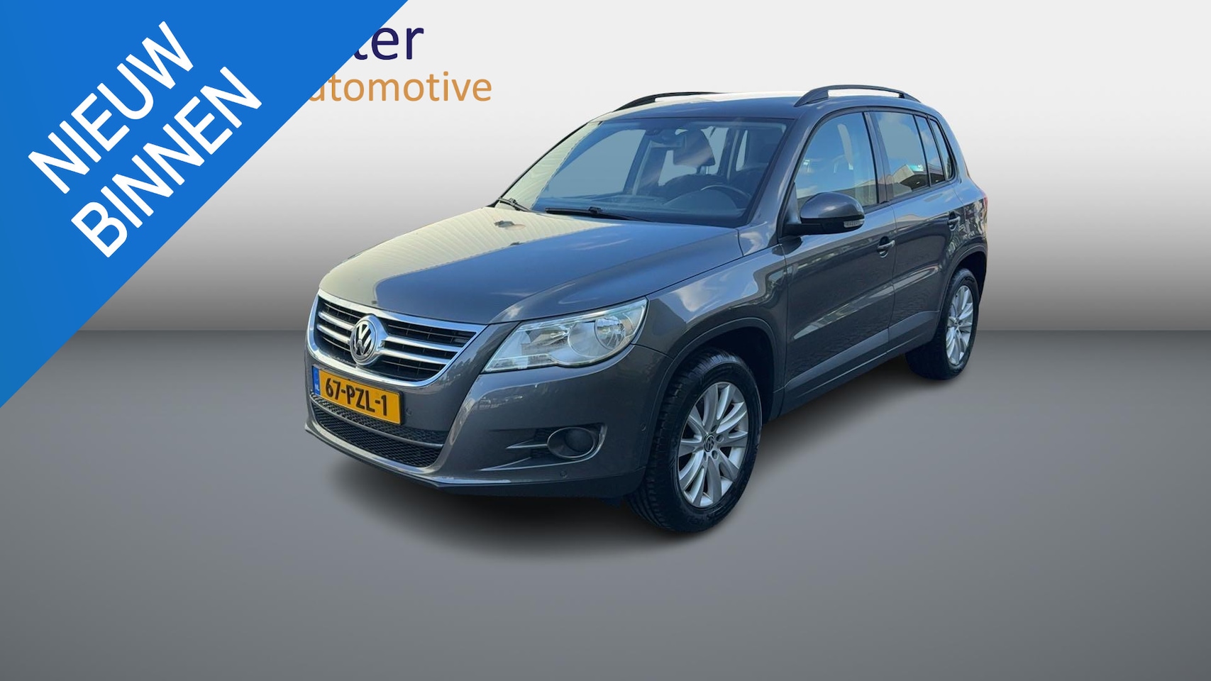 Volkswagen Tiguan - 1.4 TSI Comfort&Design Navigatie|Trekhaak|Volledig Onderhouden - AutoWereld.nl