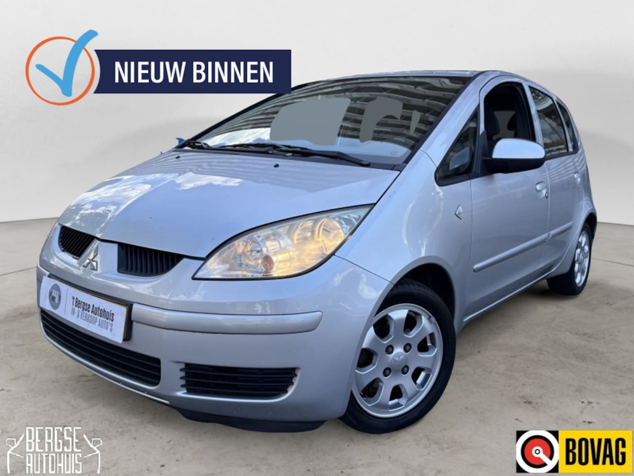 Mitsubishi Colt - 1.3 Invite Elek. Ramen Airco Lmv Nap - AutoWereld.nl