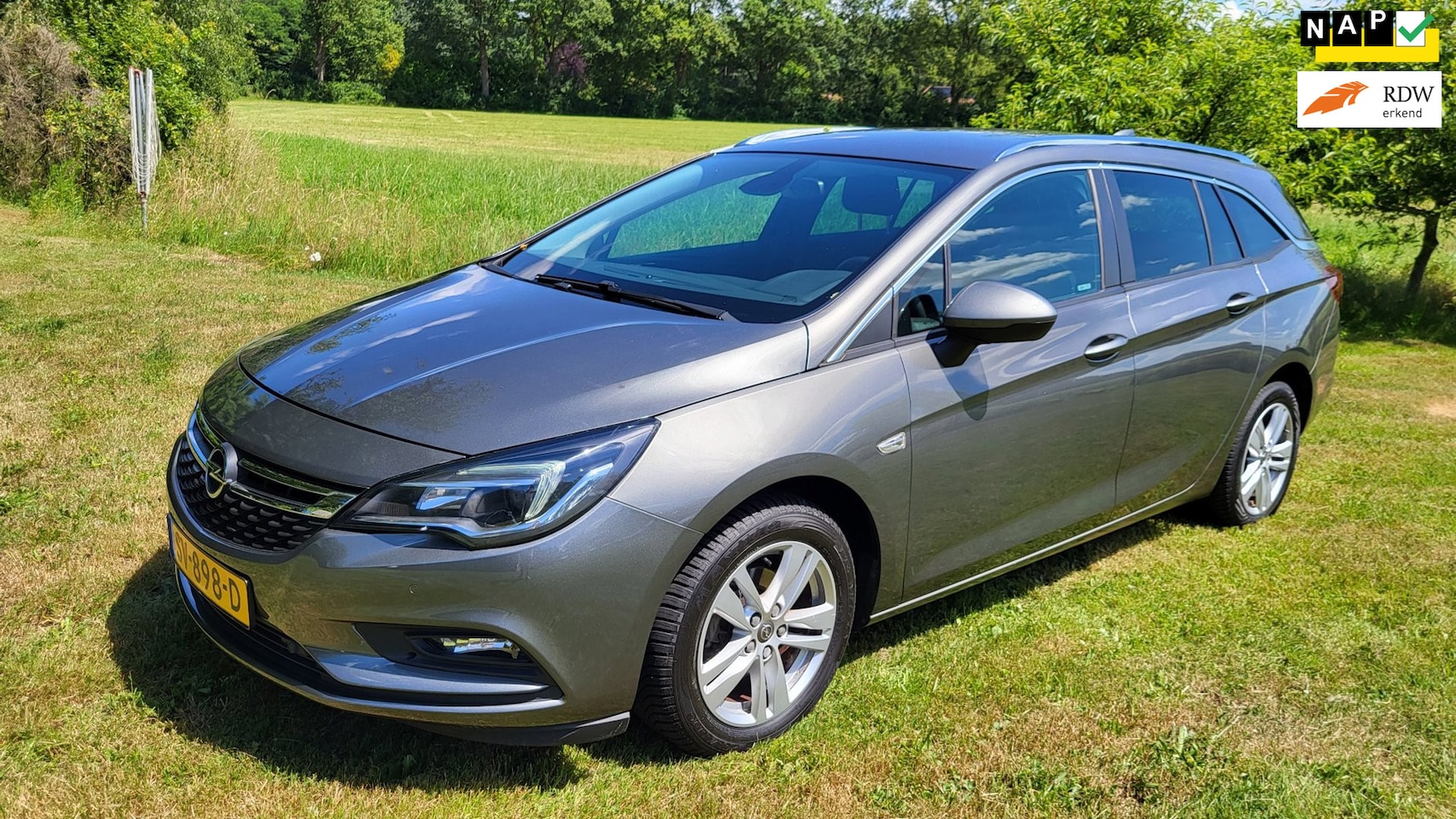 Opel Astra Sports Tourer - 1.4 Online Edition (rijklaar) Grijs - AutoWereld.nl