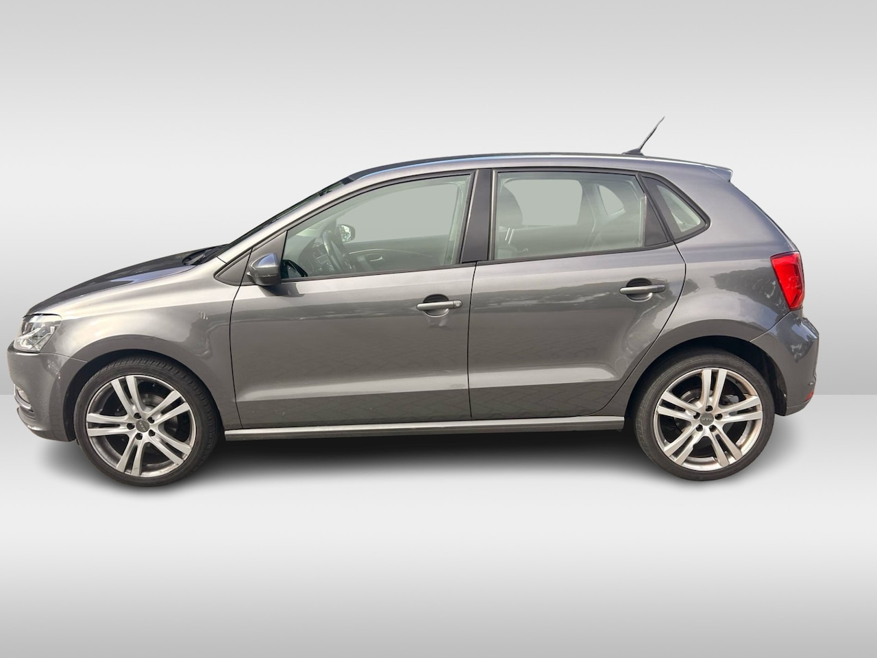 Volkswagen Polo - 1.2 TSI Comfortline / NL Auto! / 1e Eign. / Trekhaak / CarPlay / 17'' / Armsteun / Cruise - AutoWereld.nl