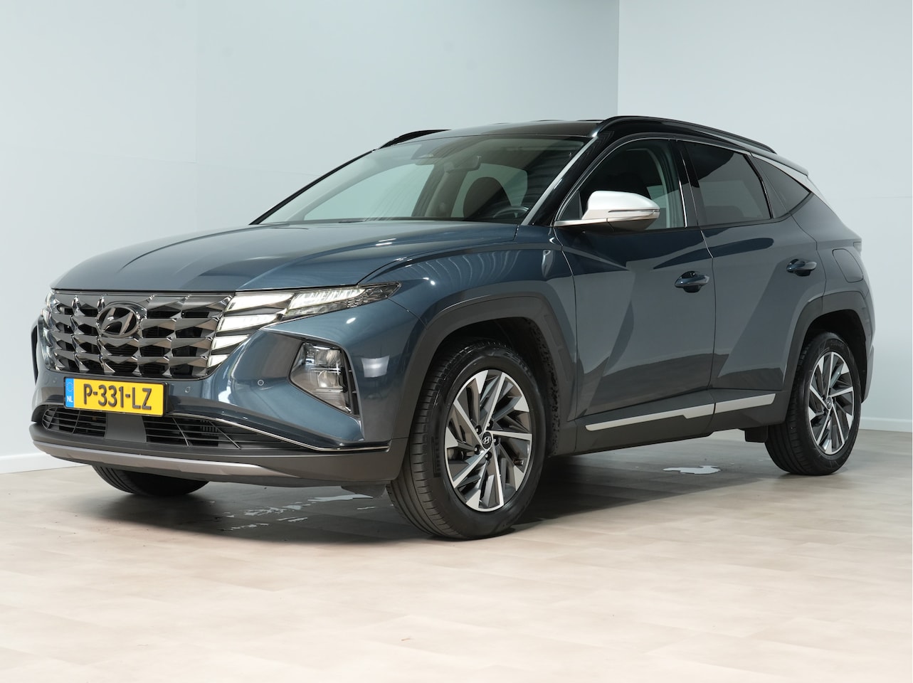 Hyundai Tucson - 1.6 T-GDI HEV Comfort Smart | Trekhaak | Camera | Navigatie | Stoel/Stuurverw. 171 - AutoWereld.nl