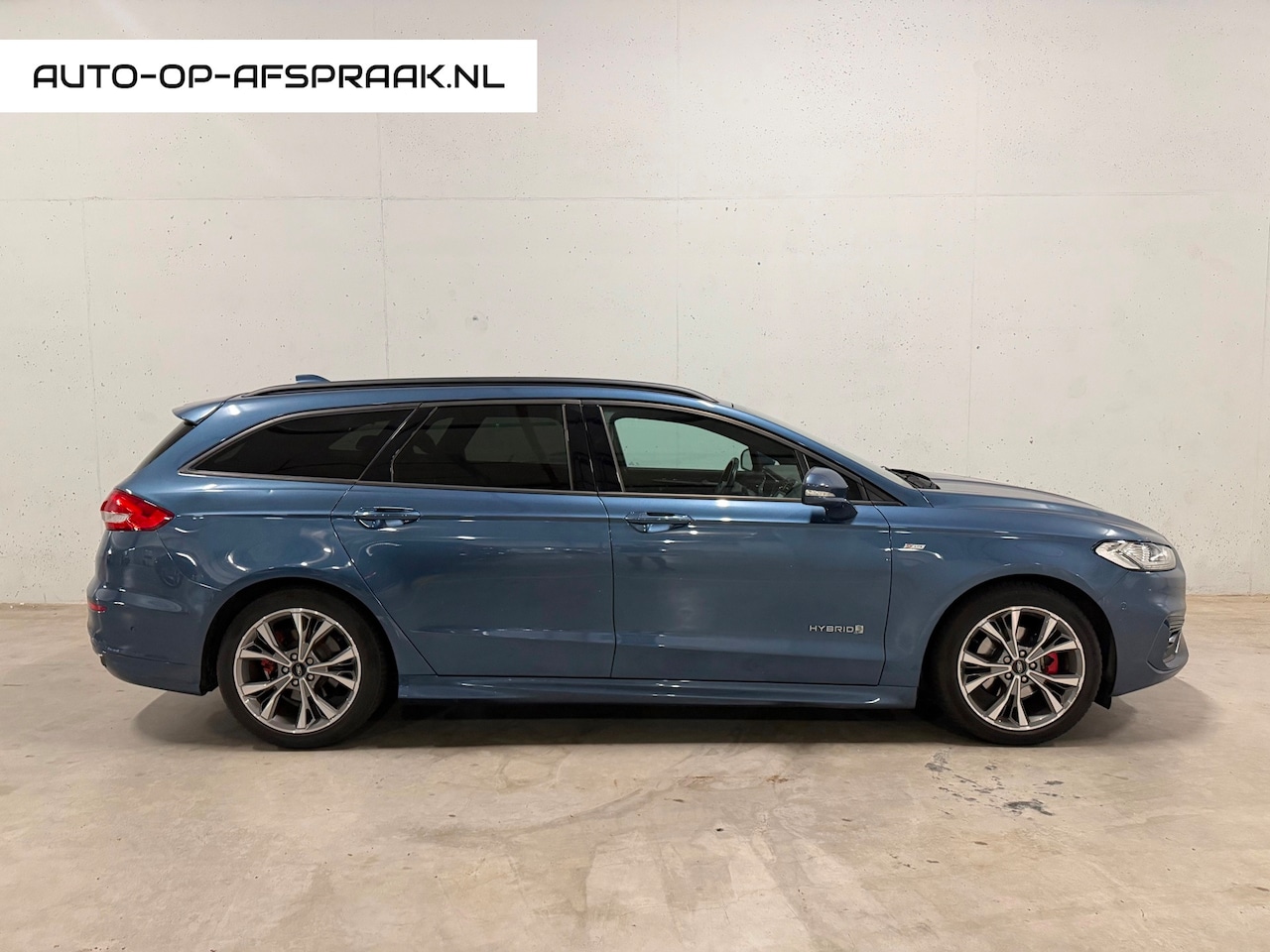Ford Mondeo Wagon - 2.0 IVCT HEV ST-Line Navi Camera Clima Cruise - AutoWereld.nl