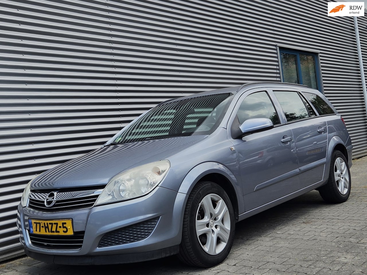 Opel Astra Wagon - 1.6 Business AUT 04-2009 Grijs Metallic - AutoWereld.nl