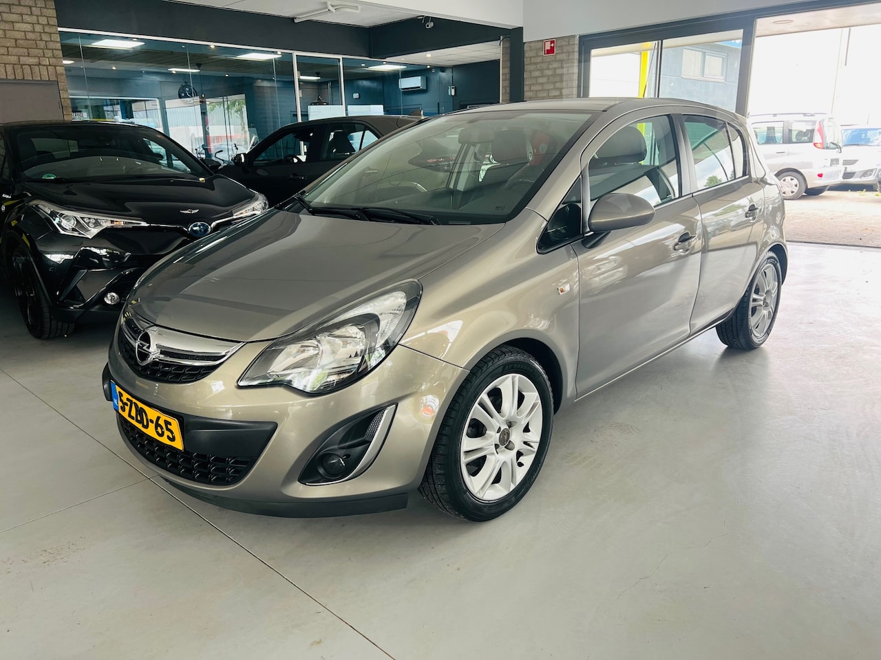 Opel Corsa - 1.4-16V BlitZ Navigatie stuurverwarming NAP - AutoWereld.nl
