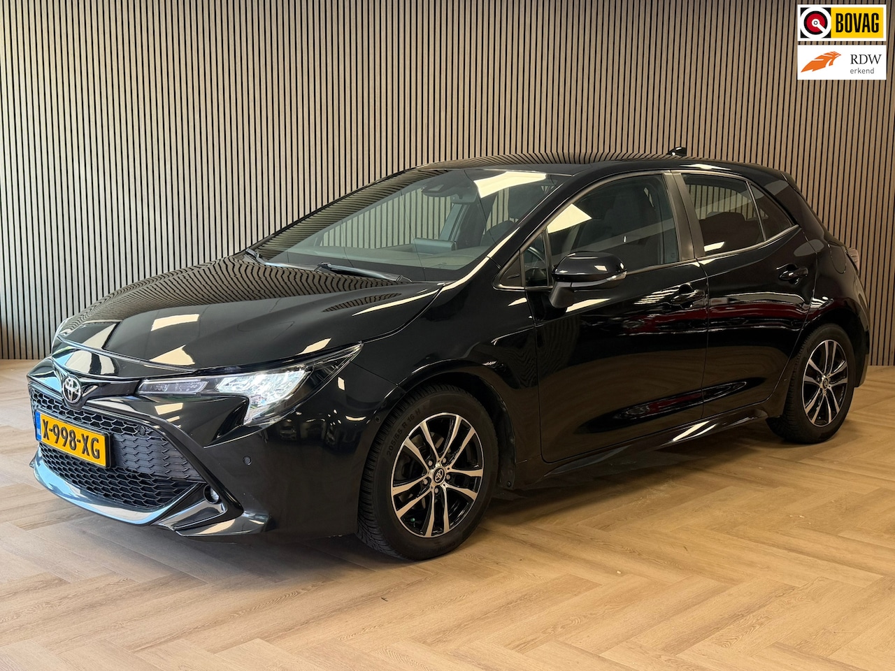 Toyota Corolla - 1.2 Turbo First Edition CAMERA PDC AIRCO CRUISE LANE-ASSIST KEYLESS-GO BLUETOOTH MIRRORCAS - AutoWereld.nl