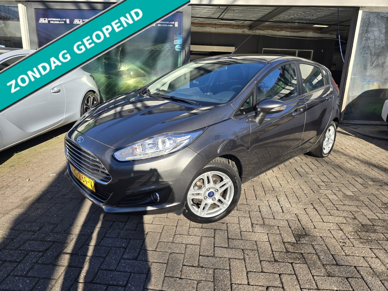 Ford Fiesta - 1.0 EcoBoost Titanium | 2E EIGENAAR | 12MND GARANTIE | AIRCO | CRUISE | LMV | NW APK | - AutoWereld.nl