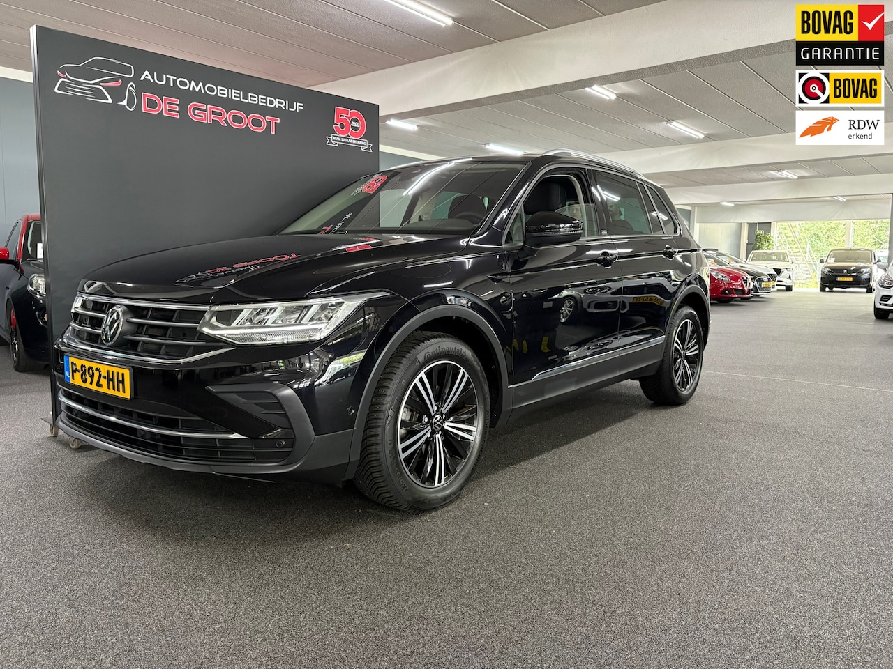 Volkswagen Tiguan - 1.5 TSI R-Line Business+/ Automaat/ Stoel en stuur verwarming - AutoWereld.nl