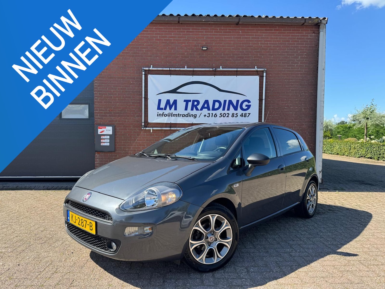 Fiat Punto Evo - 0.9 TwinAir Lounge CLIMA TREKHAAK LMV PDC 6-BAK 2 SLEUTELS + BOEKJES! NAP! - AutoWereld.nl