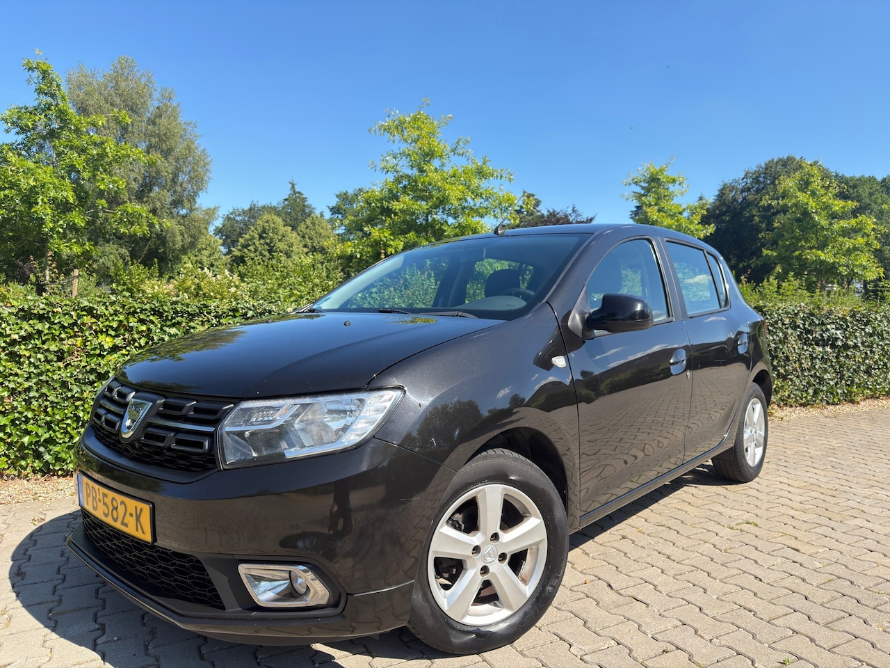 Dacia Sandero - 0.9 TCe Bi-Fuel Laureate 0.9 TCe Bi-Fuel Laureate 5-Deurs , Airco / Cruise / Navi-Multimedia / Isofix / Pdc / 15" L - AutoWereld.nl