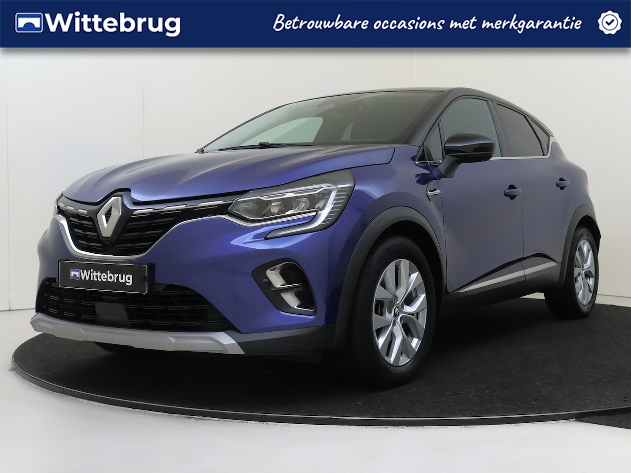 Renault Captur - 1.6 E-Tech Hybrid 145 Intens | Navigatie | Camera | Carplay | Cruise | - AutoWereld.nl