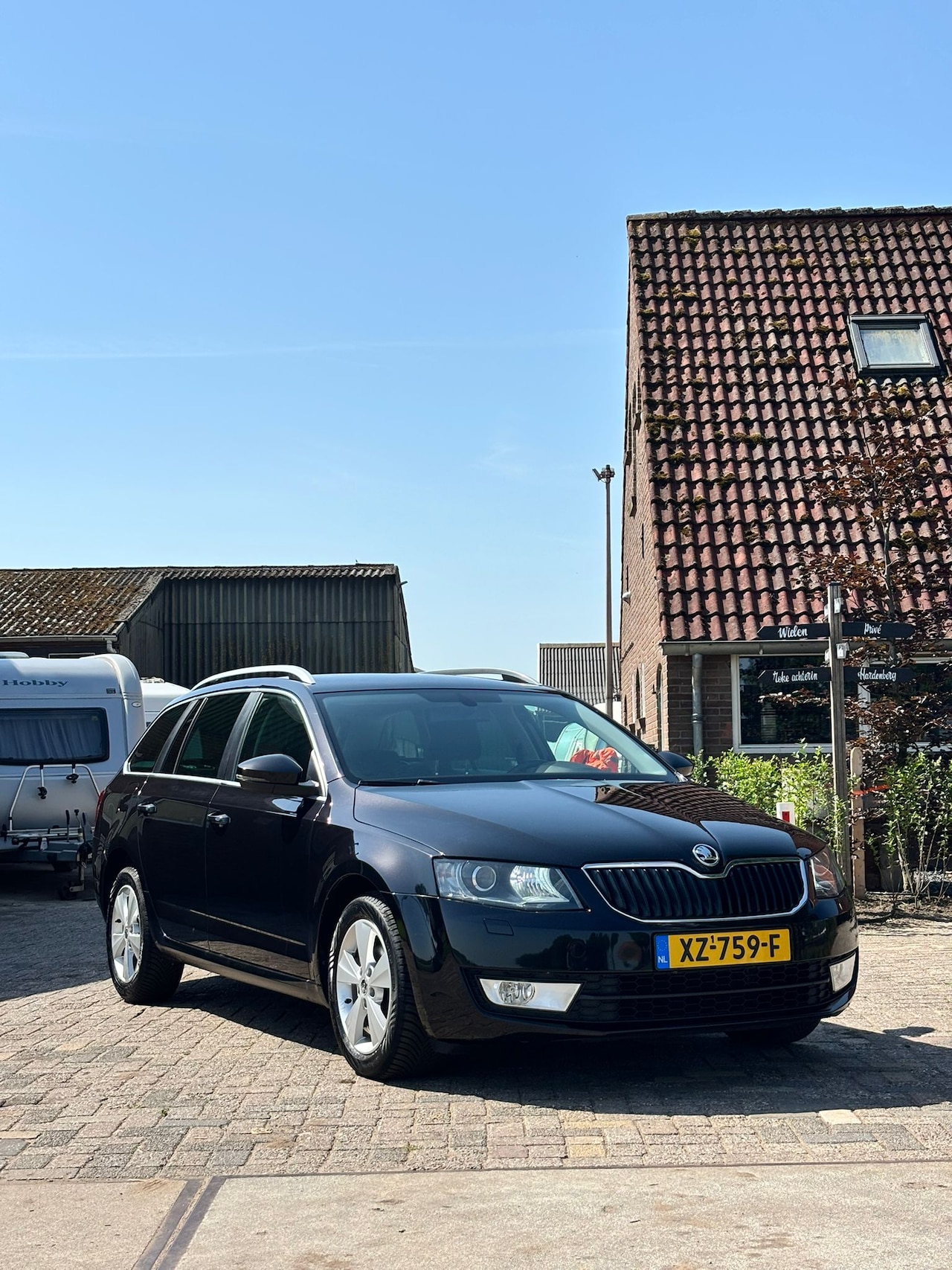 Skoda Octavia Combi - 1.6 TDI Greentech Elegance Businessline Trekhaak, Gechipt - AutoWereld.nl