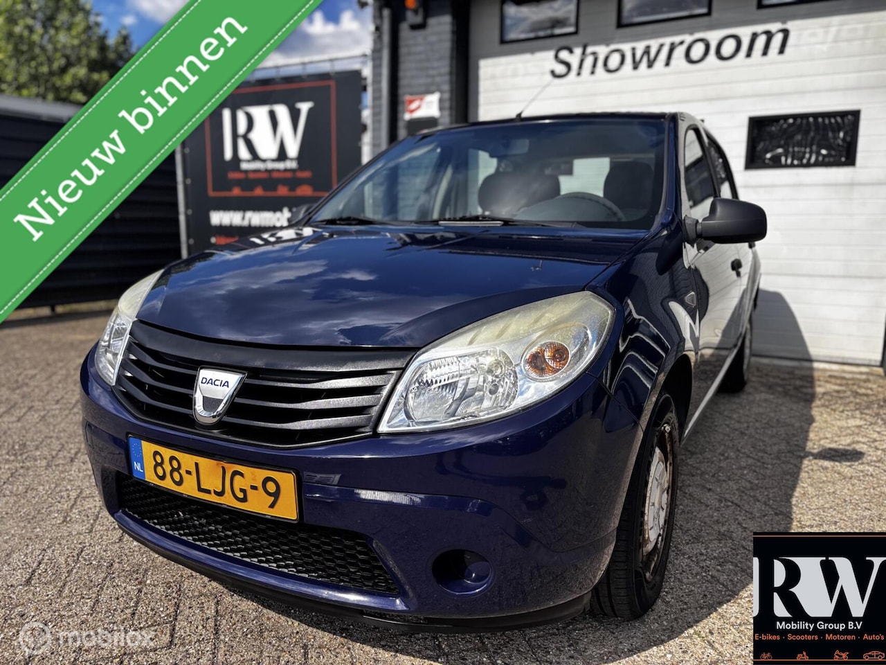 Dacia Sandero - 1.2 *NAP*5 DEURS*TREKHAAK*APK TOT 05-2027* - AutoWereld.nl