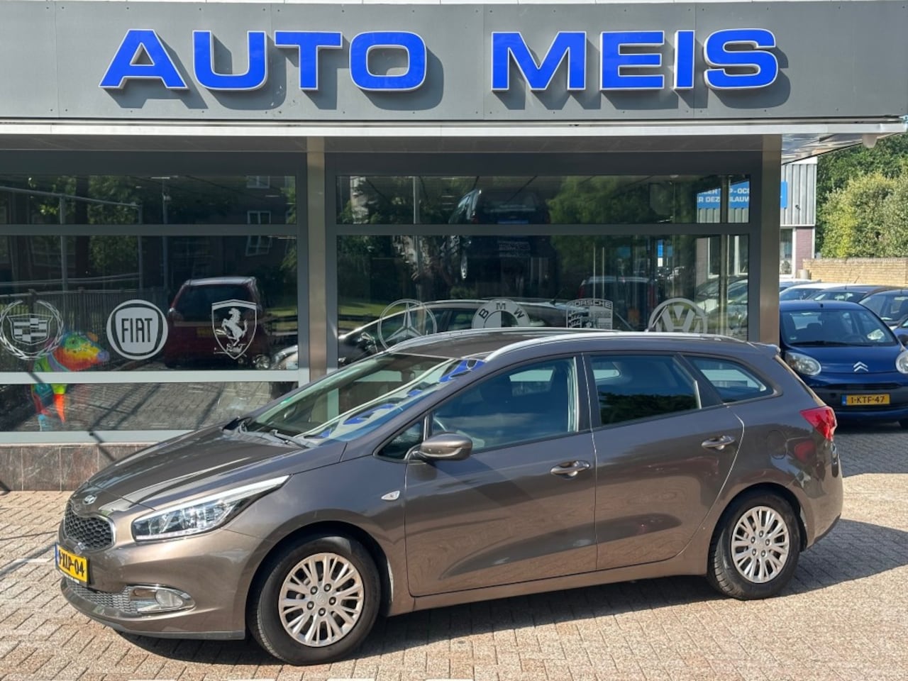 Kia Cee'd - 1.6 GDI Comfortline Airco Cruise Telefoon Trekhaak NAP-Autopas - AutoWereld.nl