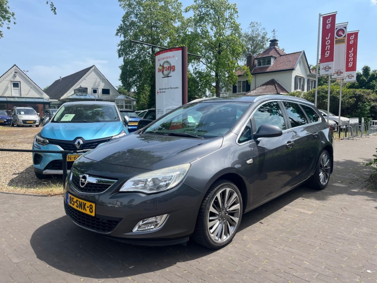 Opel Astra Sports Tourer - SPORTS TOURER 1.4 TURBO COSMO 140PK / NAVI / CRUISE CTR. / AIRCO-ECC / 18'' LM-VELGEN - AutoWereld.nl