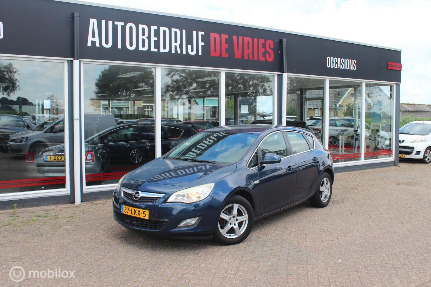 Opel Astra - 1.4 Turbo Edition 140PK Airco/Cruise/Trekhaak/NAP - AutoWereld.nl
