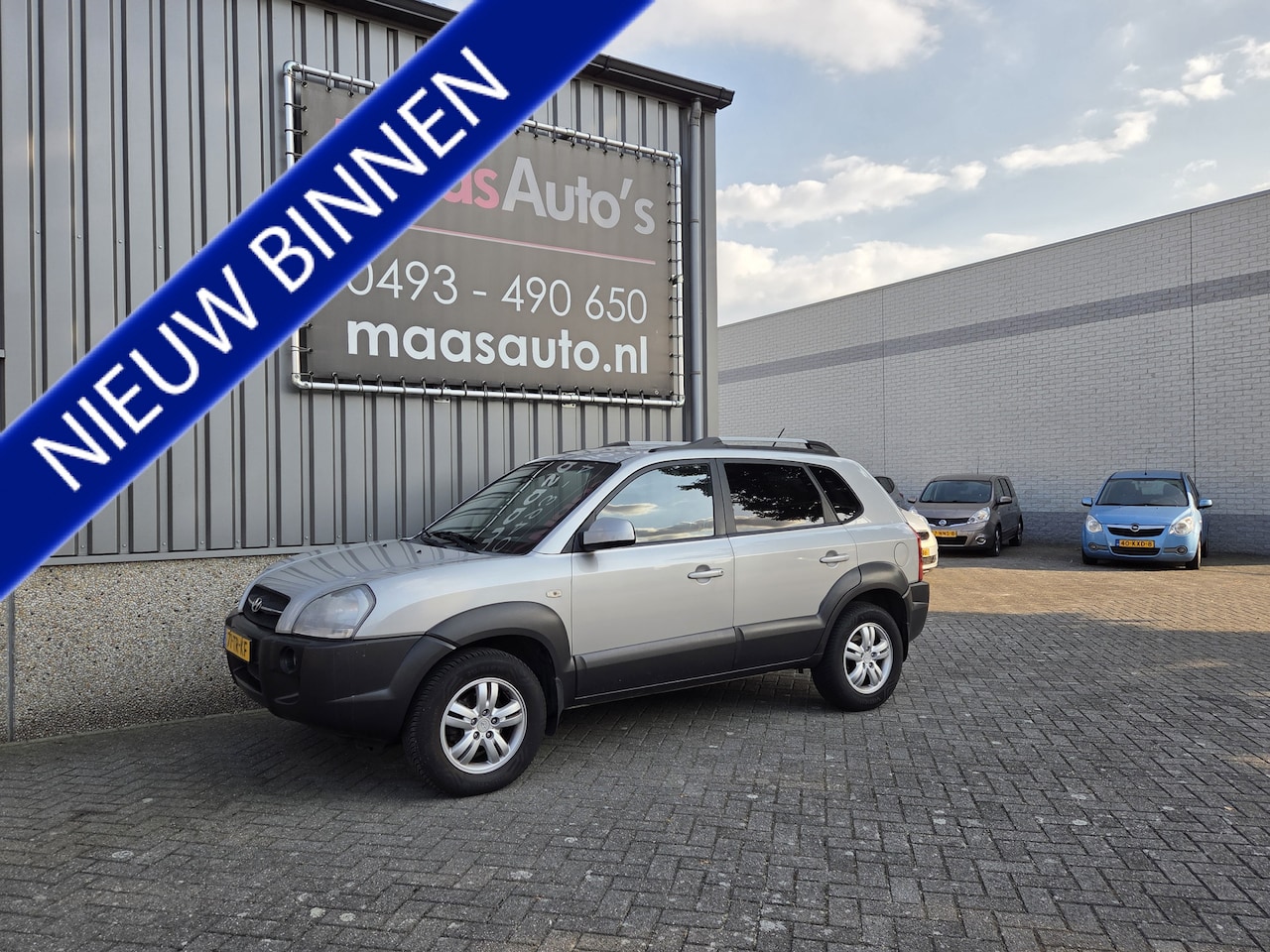 Hyundai Tucson - 2.0i 2wd S-Edition uitvoering leader /stoelverwarming airco ecc - AutoWereld.nl