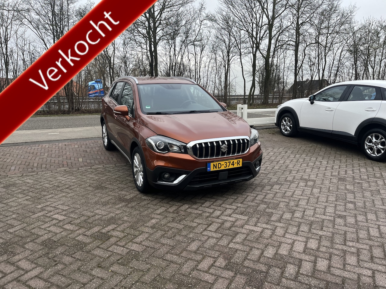 Suzuki S-Cross - 1.0 Boosterjet Exclusive TREKHAAK STOELVERWARMING CARPLAY NAVI - AutoWereld.nl